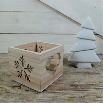 Portavelas de madera navideños