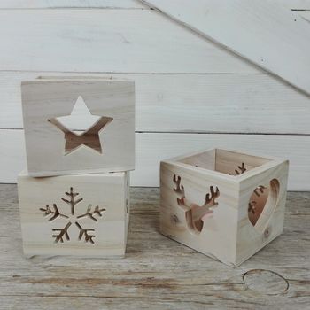 Portavelas de madera navideños